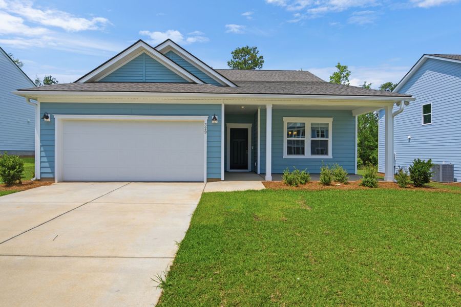 Front exterior of a new home in Carriage Estates, Lexington, SC, highlighting curb appeal (Image 20). Front exterior of a new home in Carriage Estates, Lexington, SC, highlighting curb appeal (Image 20).
