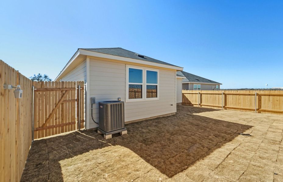 Exterior details and patio area of a home in Larson Crossing, Elgin (Image 24).