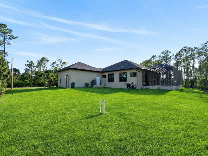 Exterior details and patio area of a home in , Port Charlotte (Image 54).