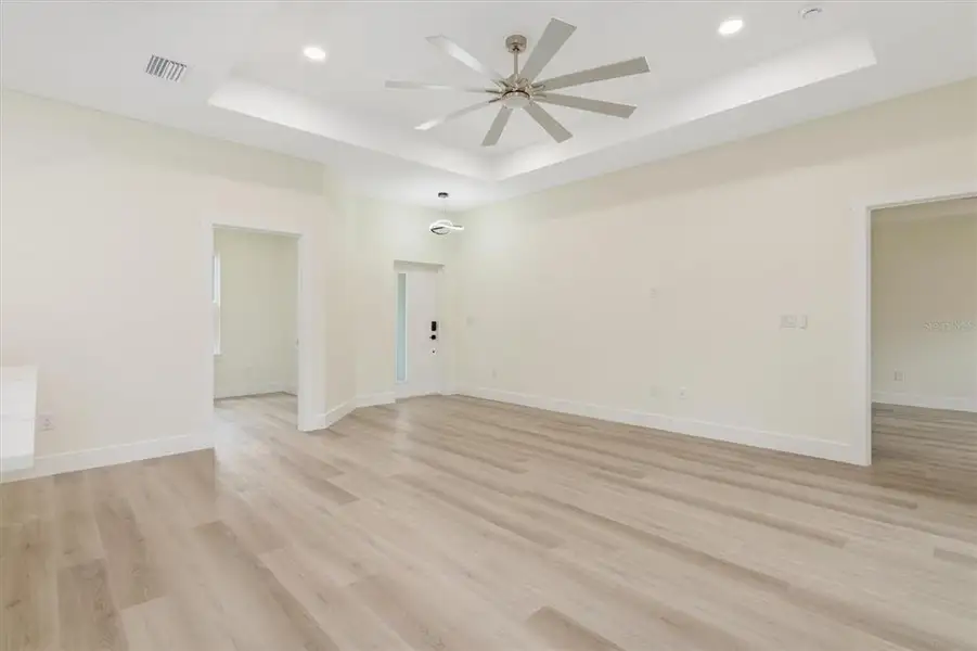 Spacious, unfurnished interior of a new home in , Port Charlotte (Image 23).