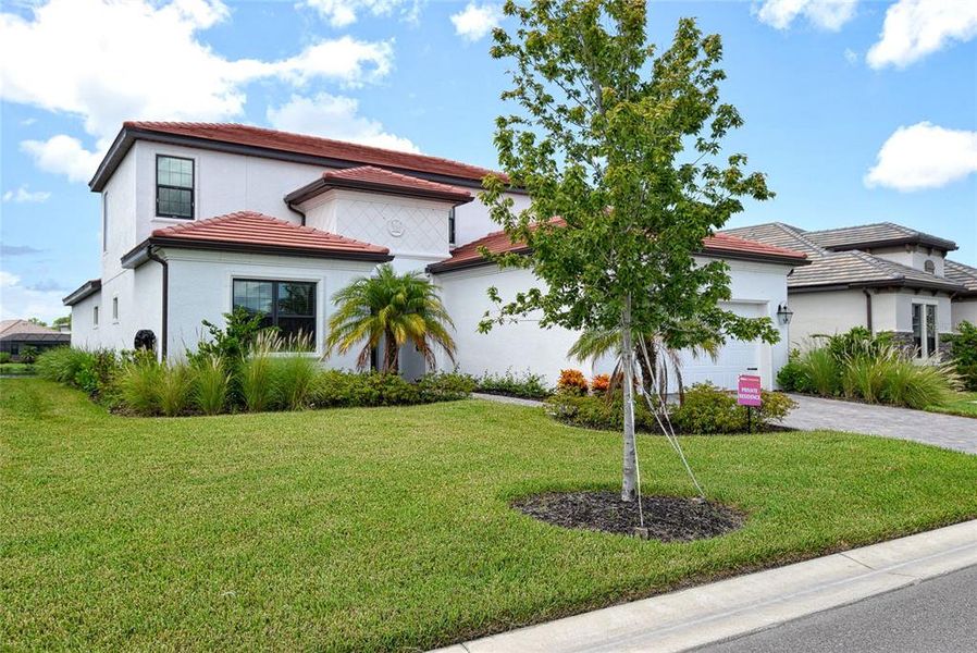 Front exterior of a new home in , Nokomis, FL, highlighting curb appeal (Image 23).
