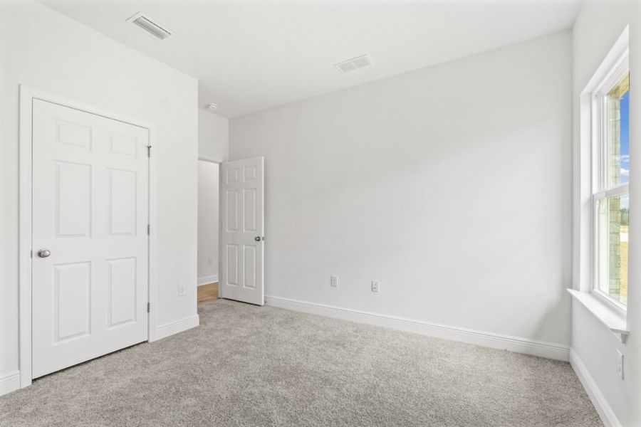 Spacious, unfurnished interior of a new home in Natureview, Freeport (Image 21).