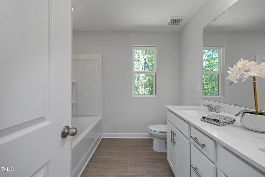 Furnished interior view inside a new home in Wellers Knoll, Lillington (Image 24).