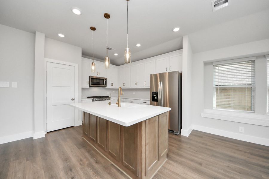 Furnished interior view inside a new home in Laurel Landing: Landmark Collection, Alvin (Image 6). Furnished interior view inside a new home in Laurel Landing: Landmark Collection, Alvin (Image 6).