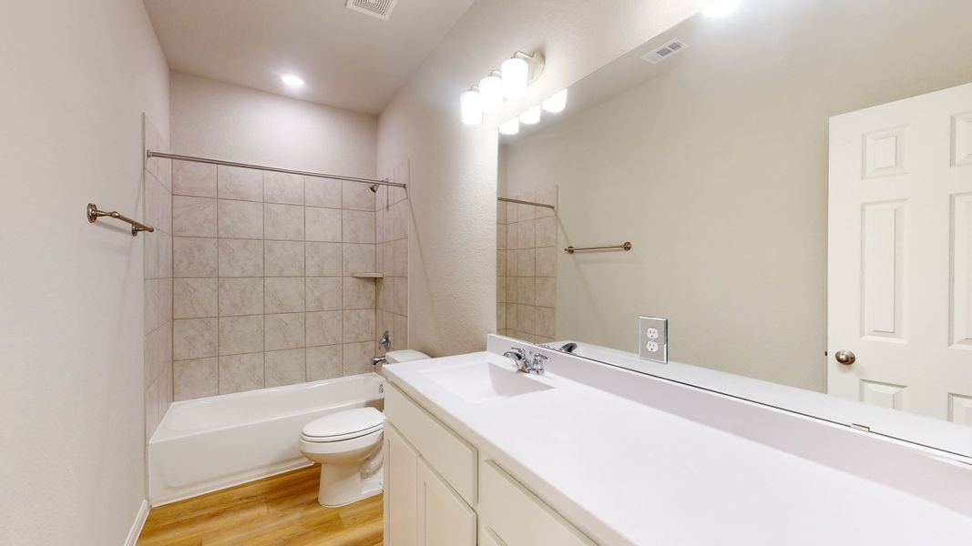 Representative furnished interior of a home built from the Floor Plan 1500 by Colina Homes in Cypress Green, Hockley (Image 14).