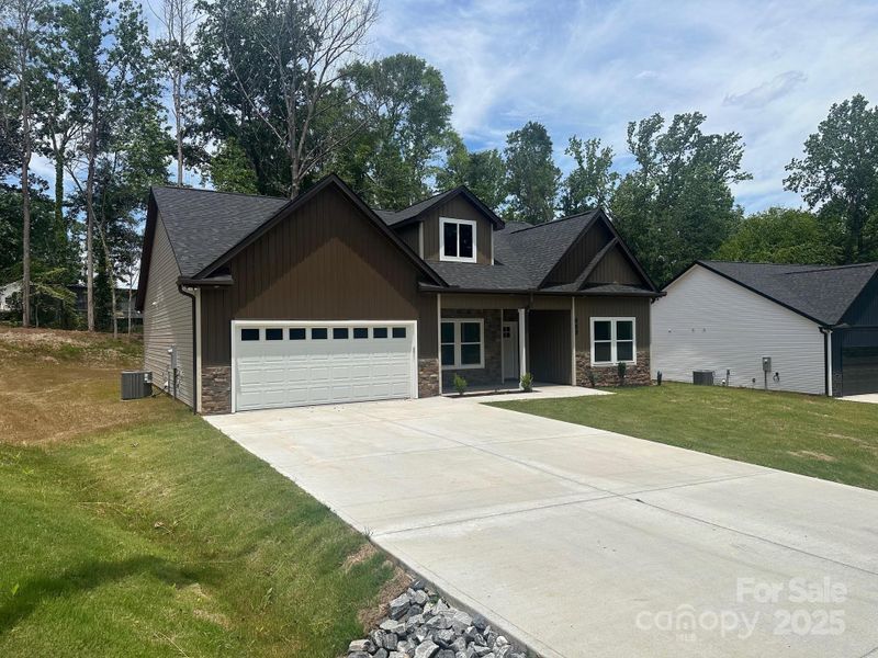Front exterior of a new home in , Spartanburg, SC, highlighting curb appeal (Image 2). Front exterior of a new home in , Spartanburg, SC, highlighting curb appeal (Image 2).