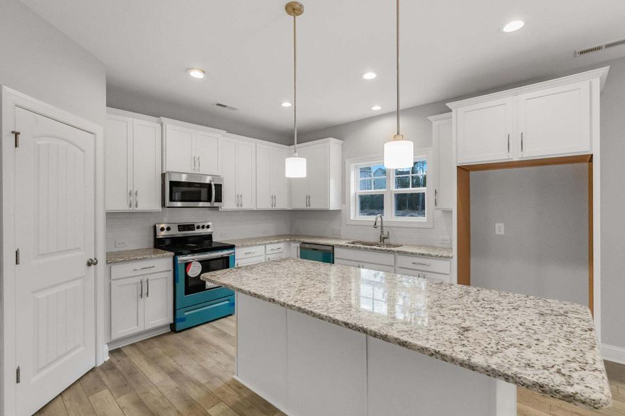 Representative furnished interior of a home built from the Drayton by Caviness & Cates Communities in Bartlett Manor, Youngsville (Image 177).