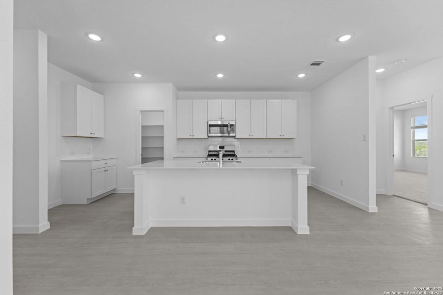 Furnished interior view inside a new home in Waterwheel: Coastline Collection, San Antonio (Image 9).