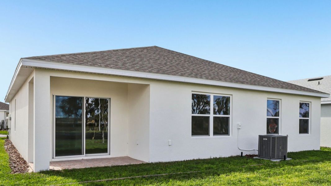 Representative exterior photo of a completed home built from the Baker by DRB Homes in Willowbrook North, Winter Haven, FL (Image 26).