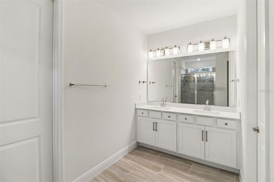 Furnished interior view inside a new home in Legends Preserve - Signature Series, Daytona Beach (Image 13).