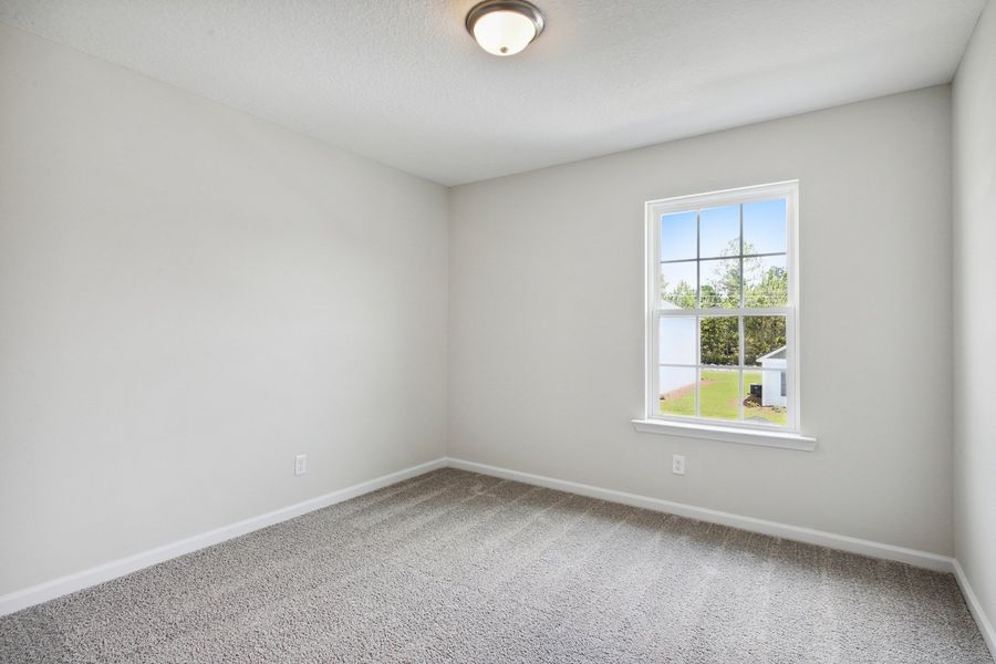 Representative unfurnished interior of a home built from the The Denmark by RTS Homes in The Pointe at Villages on Marne, Hinesville (Image 56).