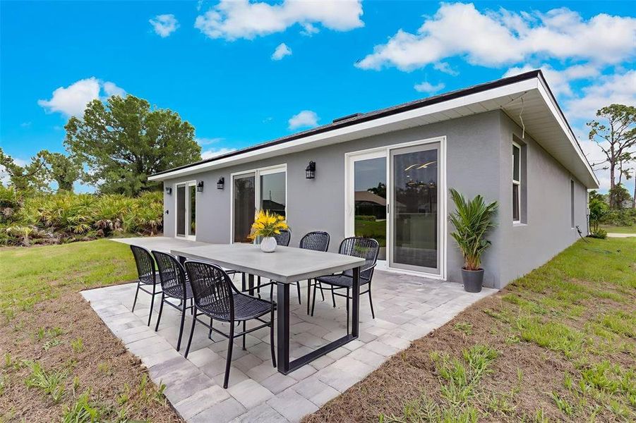 Front exterior of a new home in , Rotonda West, FL, highlighting curb appeal (Image 24).