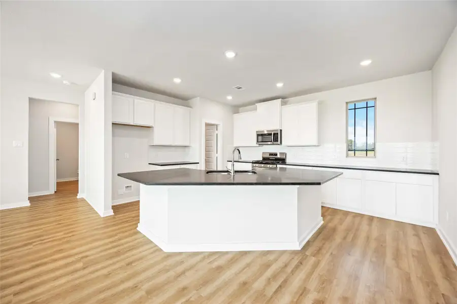 Furnished interior view inside a new home in Blue Heron Estates, Beasley (Image 4). Furnished interior view inside a new home in Blue Heron Estates, Beasley (Image 4).