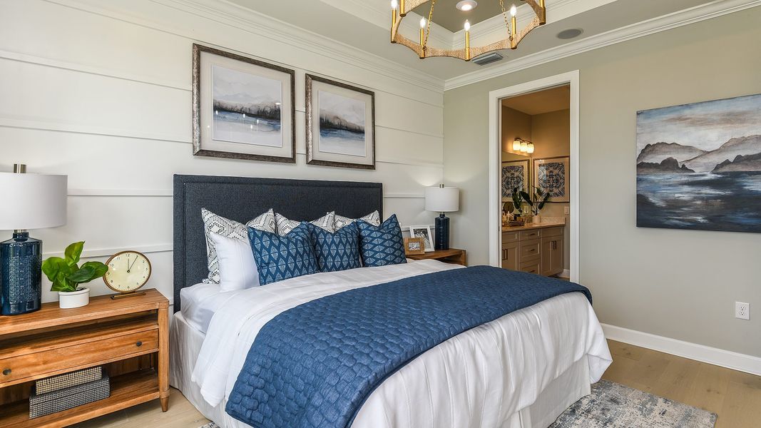 Furnished interior view inside a new home in Esplanade by the Islands, Naples (Image 12).