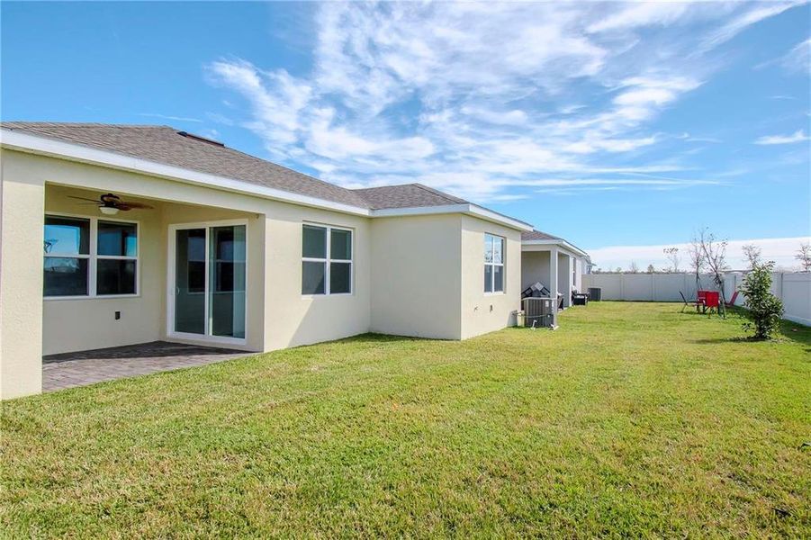 Exterior details and patio area of a home in Tohoqua Reserve, Kissimmee (Image 26).