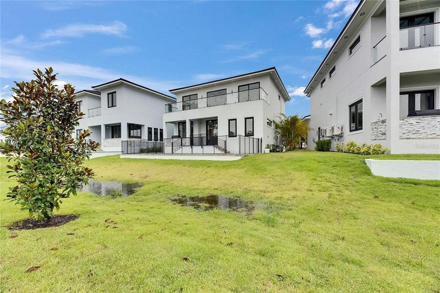 Front exterior of a new home in , Apollo Beach, FL, highlighting curb appeal (Image 32).