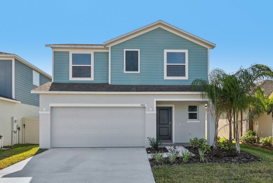 Front exterior of a new home in Briarwood, Alachua, FL, highlighting curb appeal (Image 1).