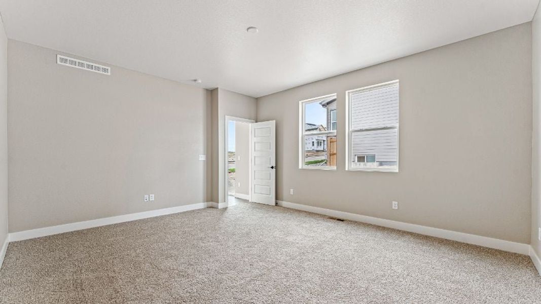 Representative unfurnished interior of a home built from the Pike by Taylor Morrison in The Aurora Highlands Town Collection, Aurora (Image 31).