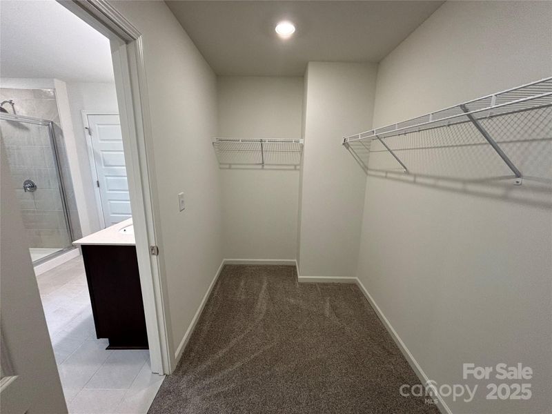 Spacious Primary Walk In Closet