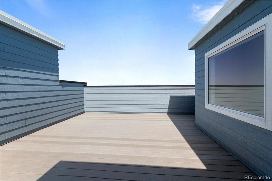 Front exterior of a new home in Dillon Pointe - Skyview, Broomfield, CO, highlighting curb appeal (Image 18).