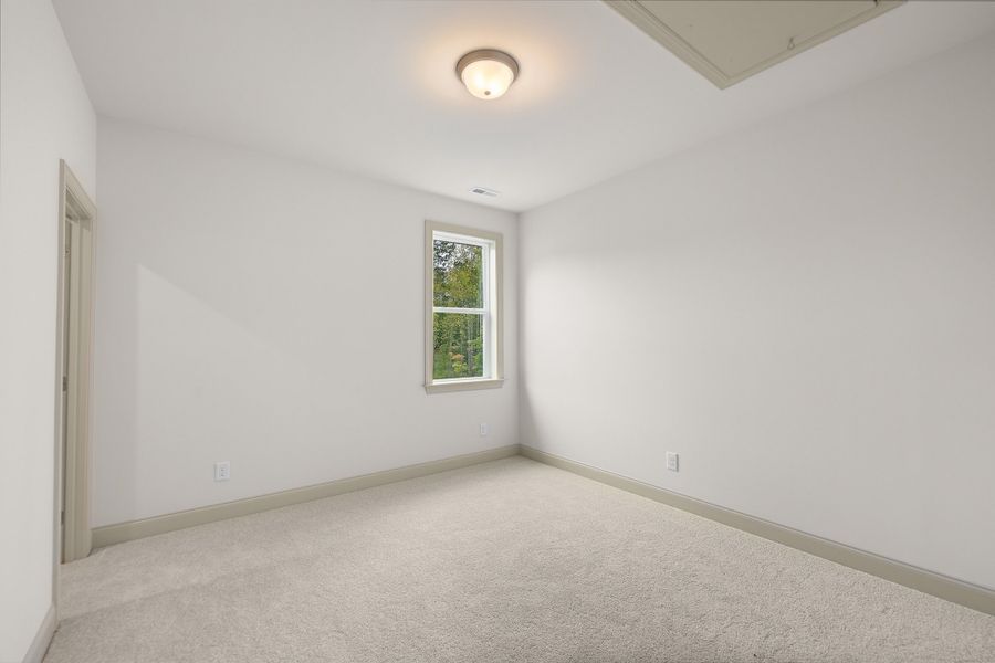 Representative unfurnished interior of a home built from the The Hampton by RobuckHomes in Baylee Ridge, Selma (Image 192).
