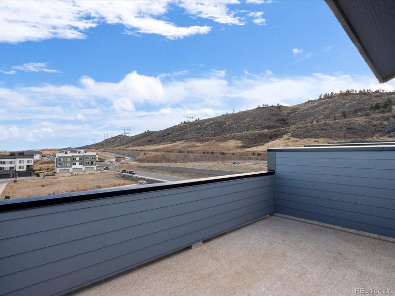 Exterior details and patio area of a home in Three Hills, Morrison (Image 24).