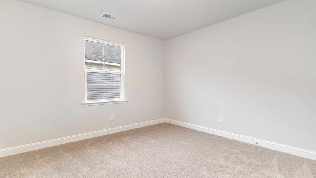 Representative unfurnished interior of a home built from the DARBY by D.R. Horton in Spring View Landing, Loris (Image 13).