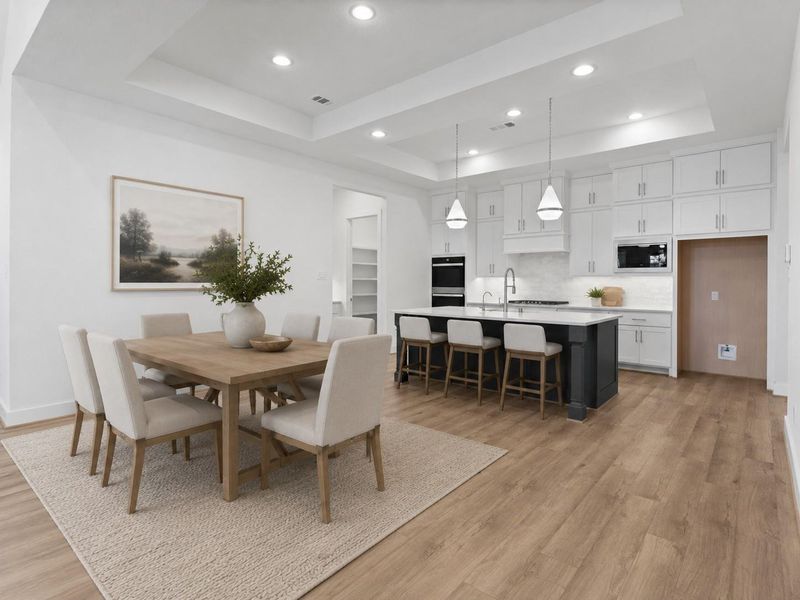 Dining room that is open to the great room and kitchen. VIRTUALLY STAGED Dining room that is open to the great room and kitchen. VIRTUALLY STAGED