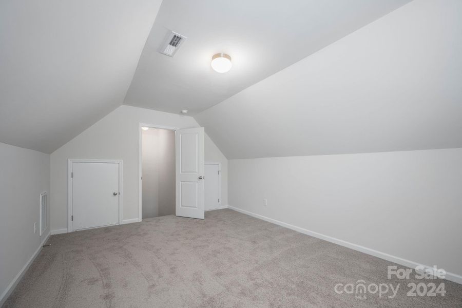 Large Bonus Room with Storage Closets