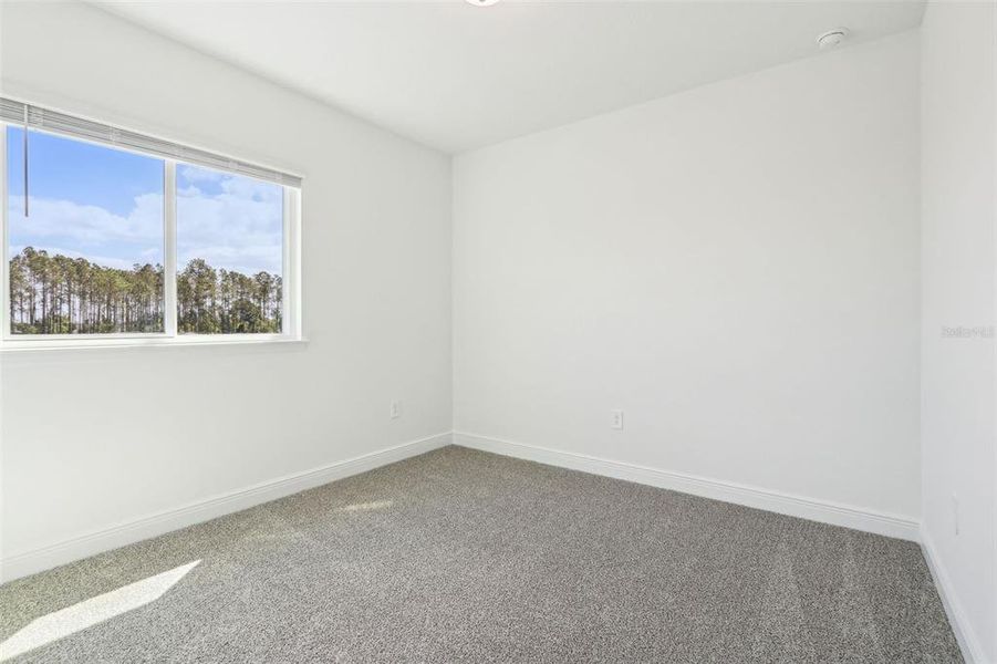 Spacious, unfurnished interior of a new home in Cyrene at Minneola - Villas, Minneola (Image 24).