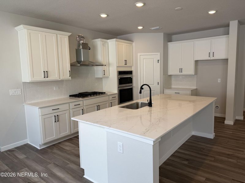 Furnished interior view inside a new home in Reserve East, Flagler Beach (Image 13).