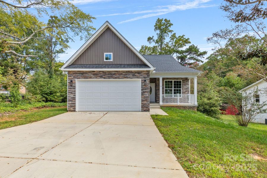 Front exterior of a new home in , Mocksville, NC, highlighting curb appeal (Image 19).