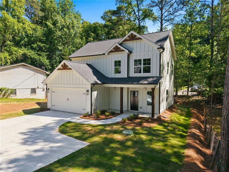 Front exterior of a new home in , Cumming, GA, highlighting curb appeal (Image 22).