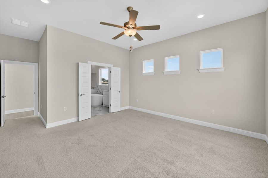 Spacious, unfurnished interior of a new home in Whisper Valley, Manor (Image 23).