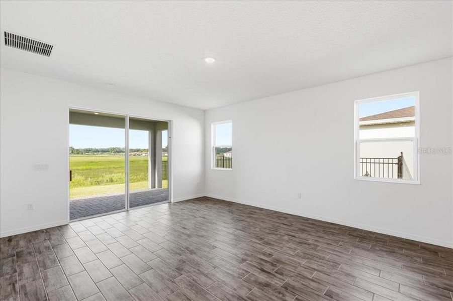 Spacious, unfurnished interior of a new home in Highfield at Twisted Oaks, Wildwood (Image 7).