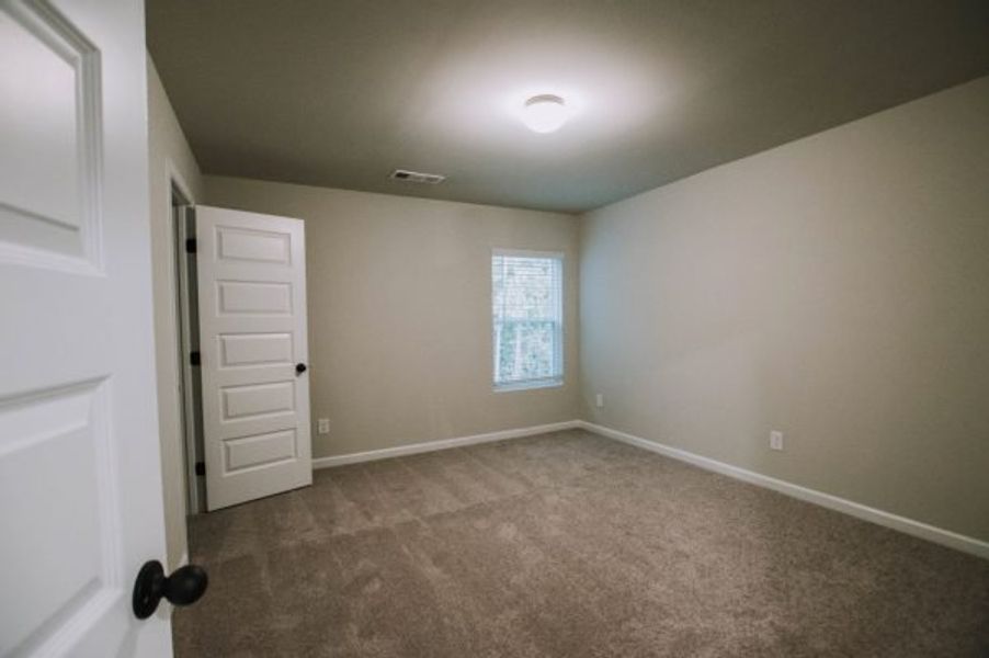 Representative unfurnished interior of a home built from the Reynolds by Piedmont Residential in Hampton Ridge, Jefferson (Image 21).