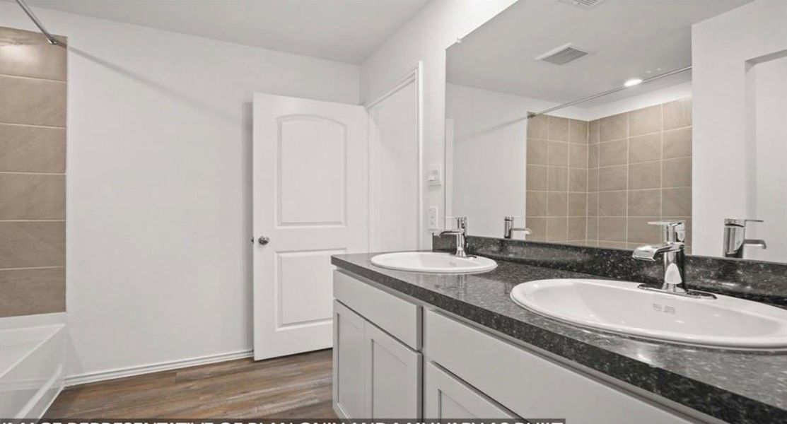 Furnished interior view inside a new home in Breckenridge Forest, Spring (Image 12).