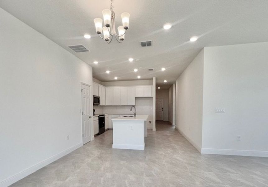 Spacious, unfurnished interior of a new home in Lakes At St Sebastian, Micco (Image 24).