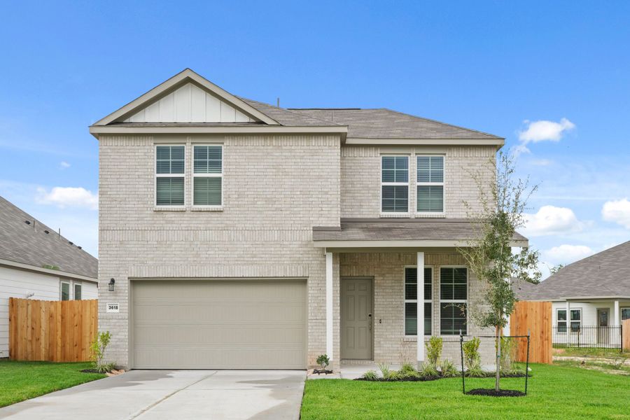 Front exterior of a new home in Russell Ranch, Bay City, TX, highlighting curb appeal (Image 1). Front exterior of a new home in Russell Ranch, Bay City, TX, highlighting curb appeal (Image 1).