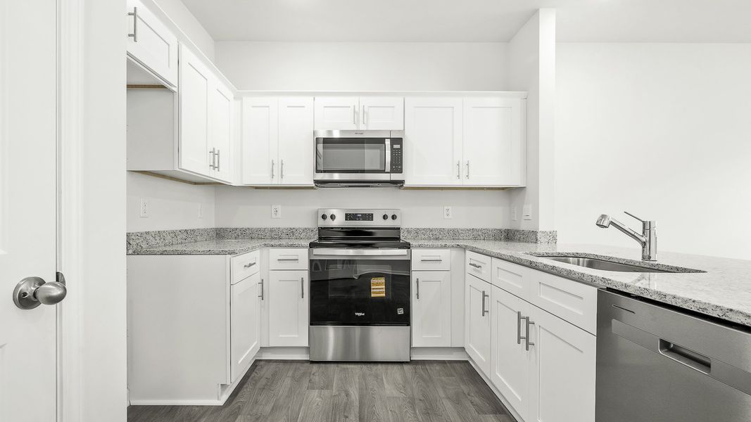 Furnished interior view inside a new home in North Village Townes, Greensboro (Image 4).