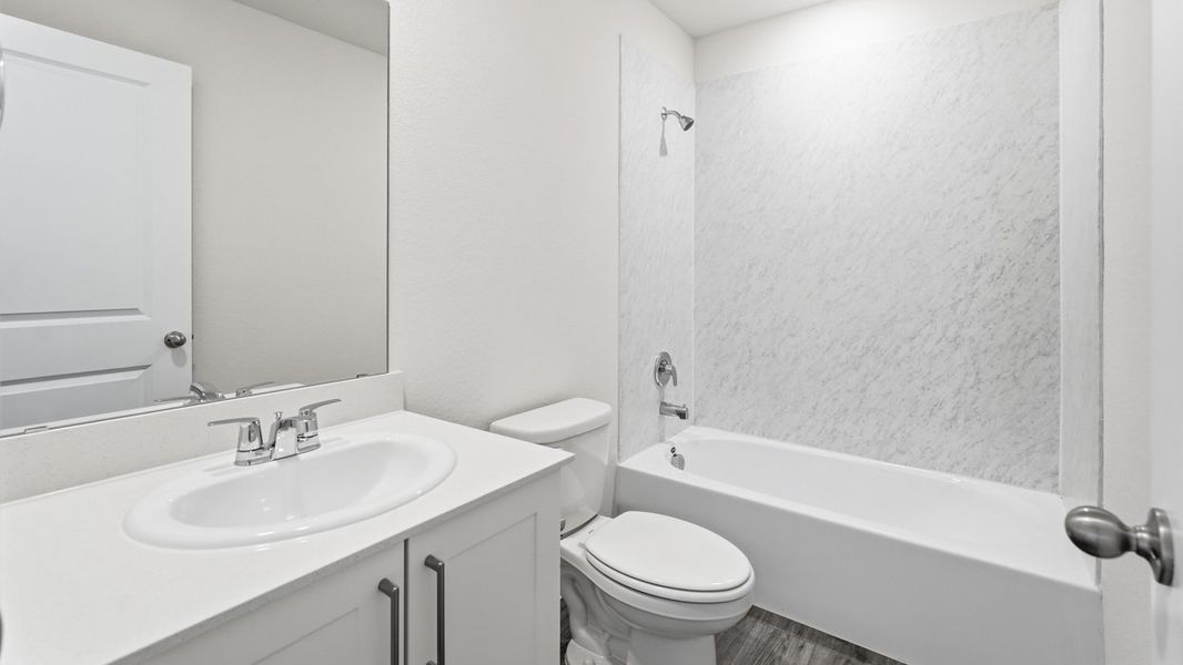 Representative furnished interior of a home built from the Caprock by D.R. Horton in Asher Oaks, Bonham (Image 8).