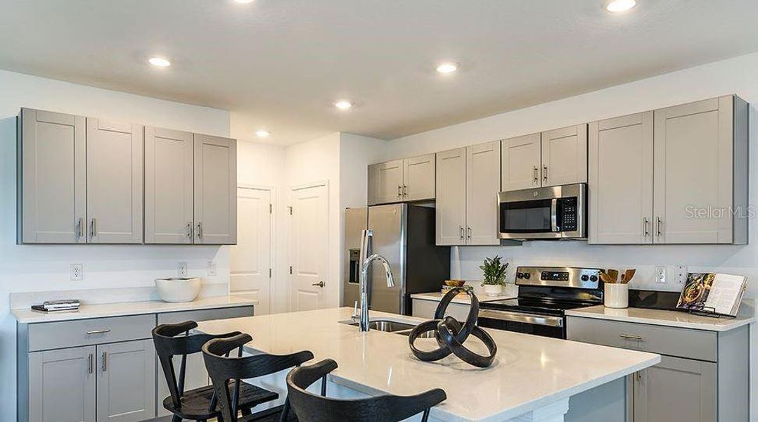 Furnished interior view inside a new home in Waterstone, Groveland (Image 20). Furnished interior view inside a new home in Waterstone, Groveland (Image 20).