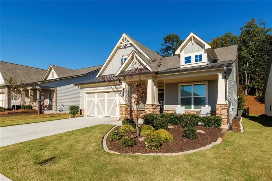 Front exterior of a new home in , Canton, GA, highlighting curb appeal (Image 1). Front exterior of a new home in , Canton, GA, highlighting curb appeal (Image 1).