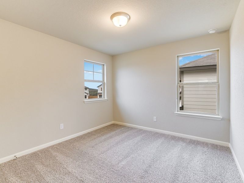 Spacious, unfurnished interior of a new home in Remington Ranch, San Antonio (Image 17).