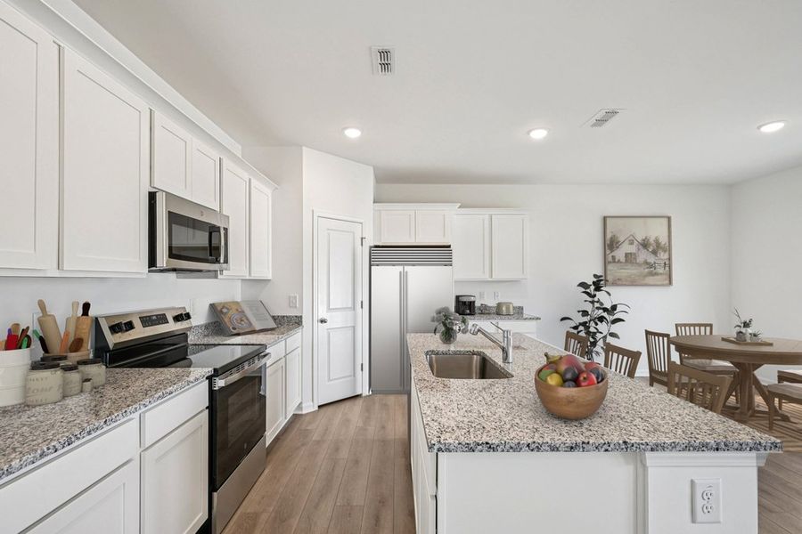 Representative furnished interior of a home built from the Meadow by Ashton Woods in Middleton Farms, Middlesex (Image 4).