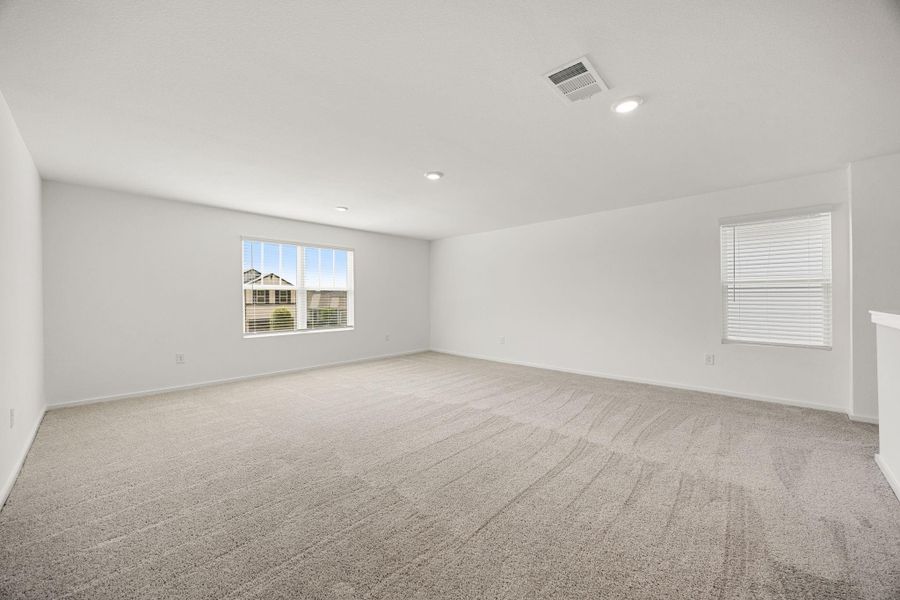 A massive upstairs game room provides the perfect flex space for a media room, playroom, homeschool area, home gym, office, or second living room. The possibilities are endless.