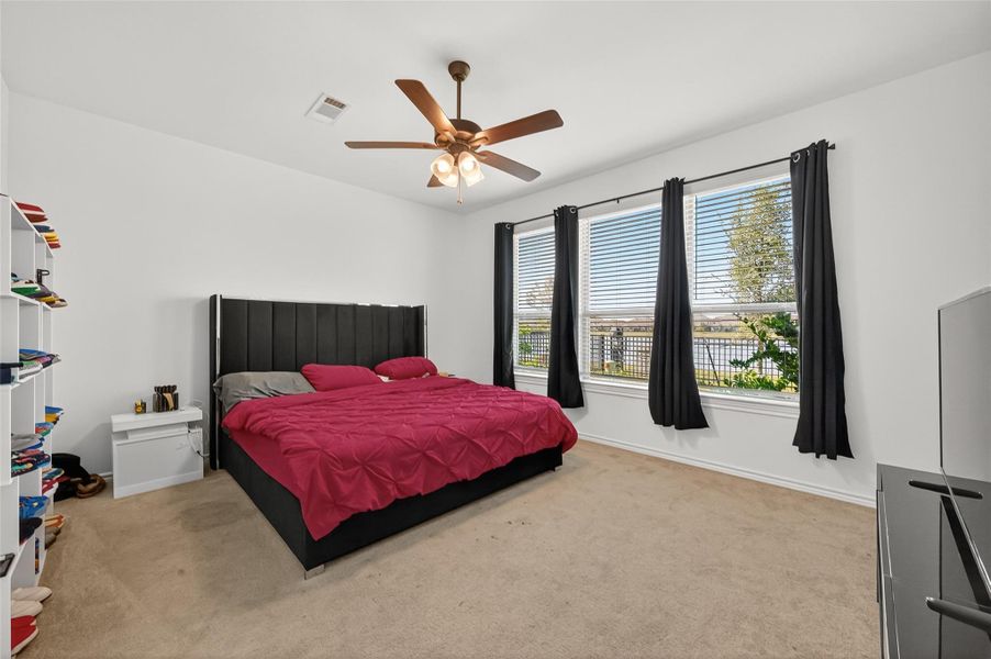 Furnished interior view inside a new home in Sunterra, Katy (Image 35).