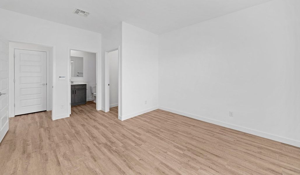 Spacious, unfurnished interior of a new home in Solterra, Green Valley (Image 24).