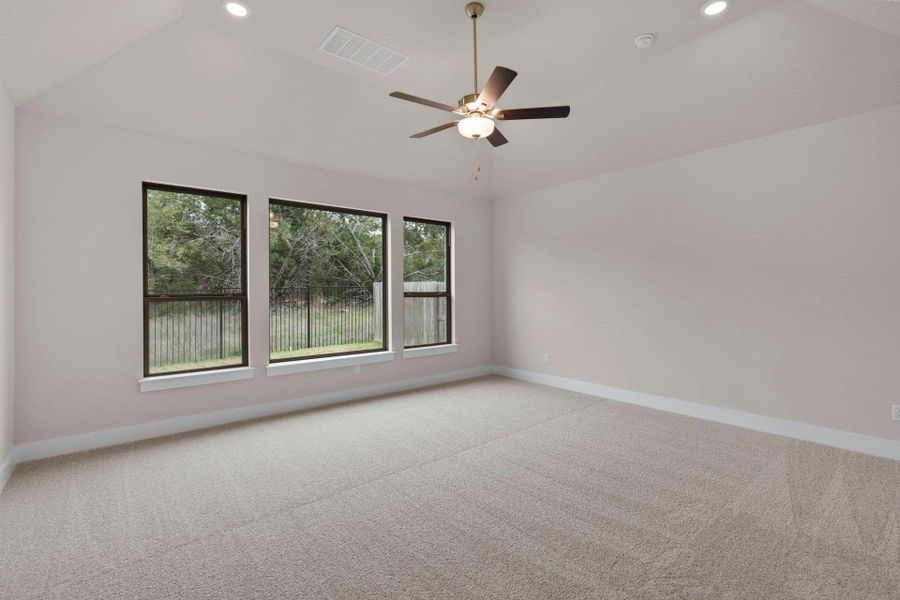 Primary Bedroom with elevated ceiling