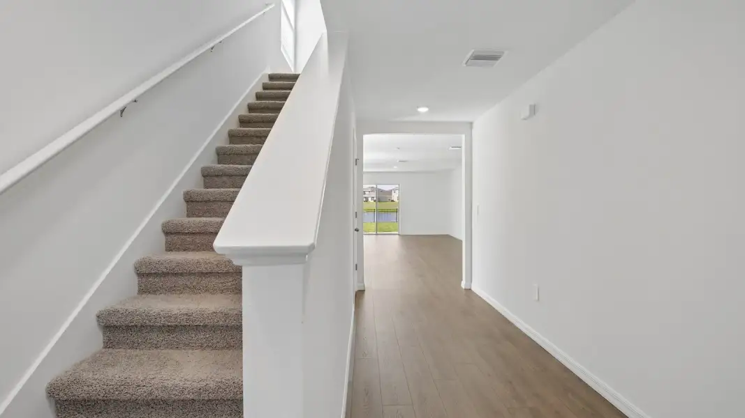 Spacious, unfurnished interior of a new home in Farm at Varrea, Plant City (Image 12).